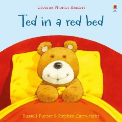 Picture of Ted in a red bed