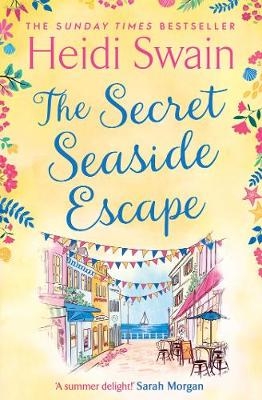 Picture of The Secret Seaside Escape: Enjoy the summer holidays with this heart-warming, feel-good romance from the Sunday Times bestseller!